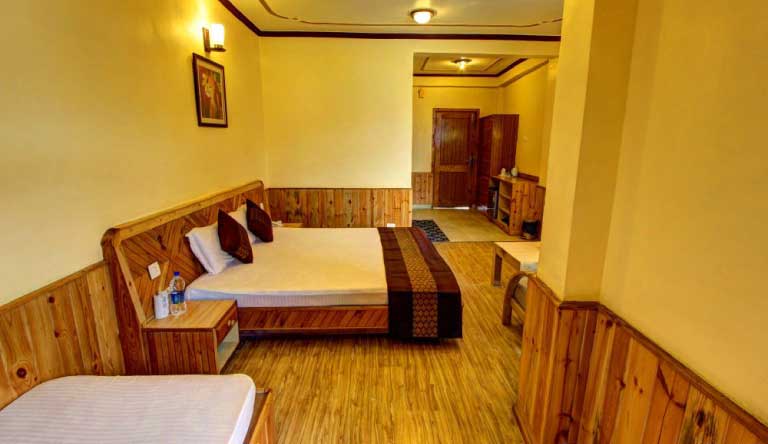 Snow-Peak-Retreat-Manali-Family-TripleBedded-Room1