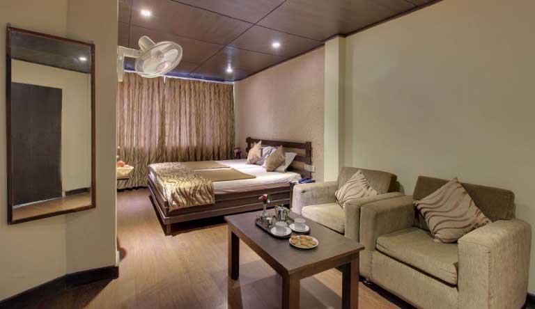 The-Corner-Deluxe-Room-with-seating-area