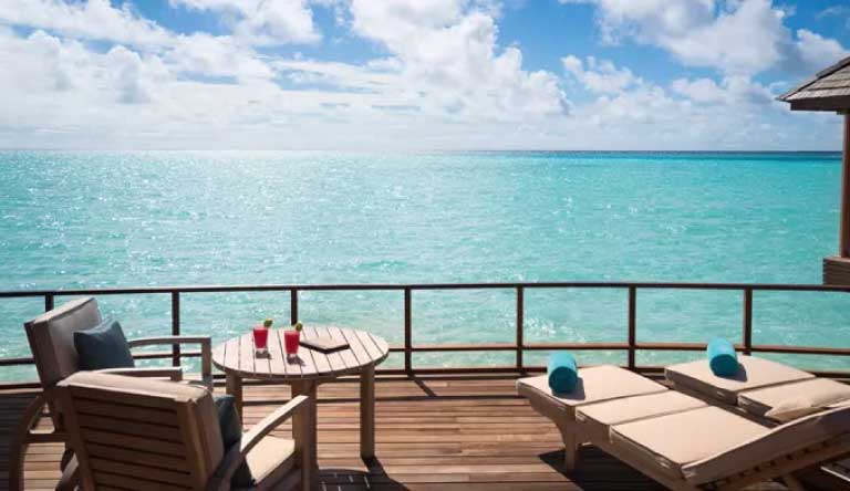 Anantara-Dhigu-Resort-Sunset-Over-Water-Suite