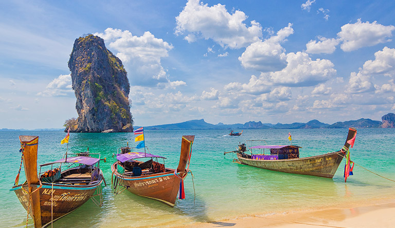 boats-on-the-koh-poda-beach-krabi-thailand
